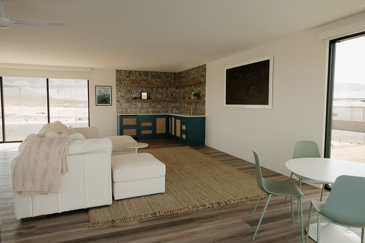 Living space with a white sectional, jute rug, sage dining chairs, and the tiled wet bar corner with teal cabinetry